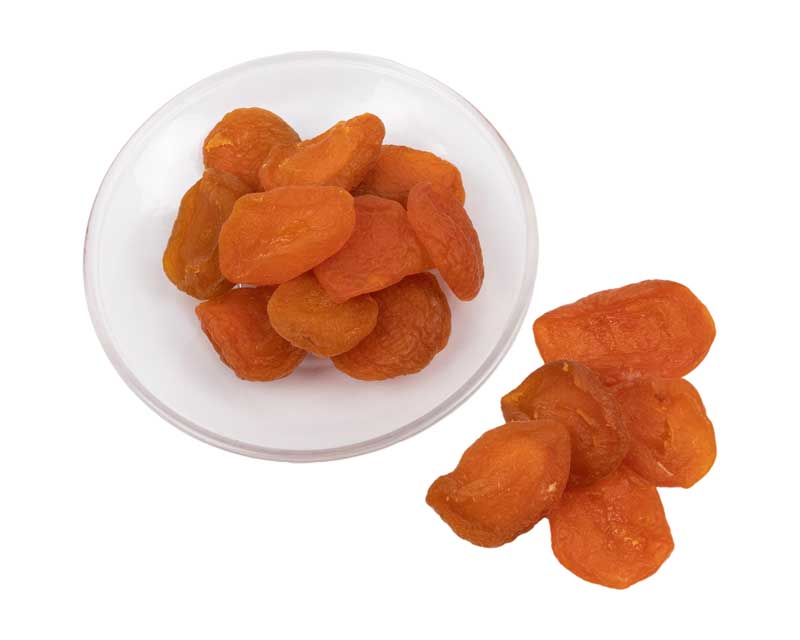 طرح زردآلو خشک و بشقاب شیشه ای
