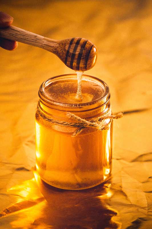 دانلود عکس ظرف عسل از کنار