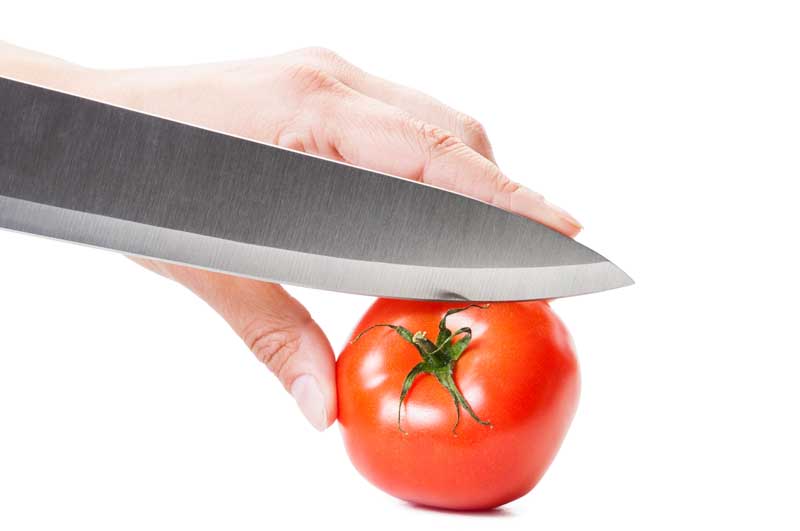 عکس  گوجه فرنگی زیر چاقو