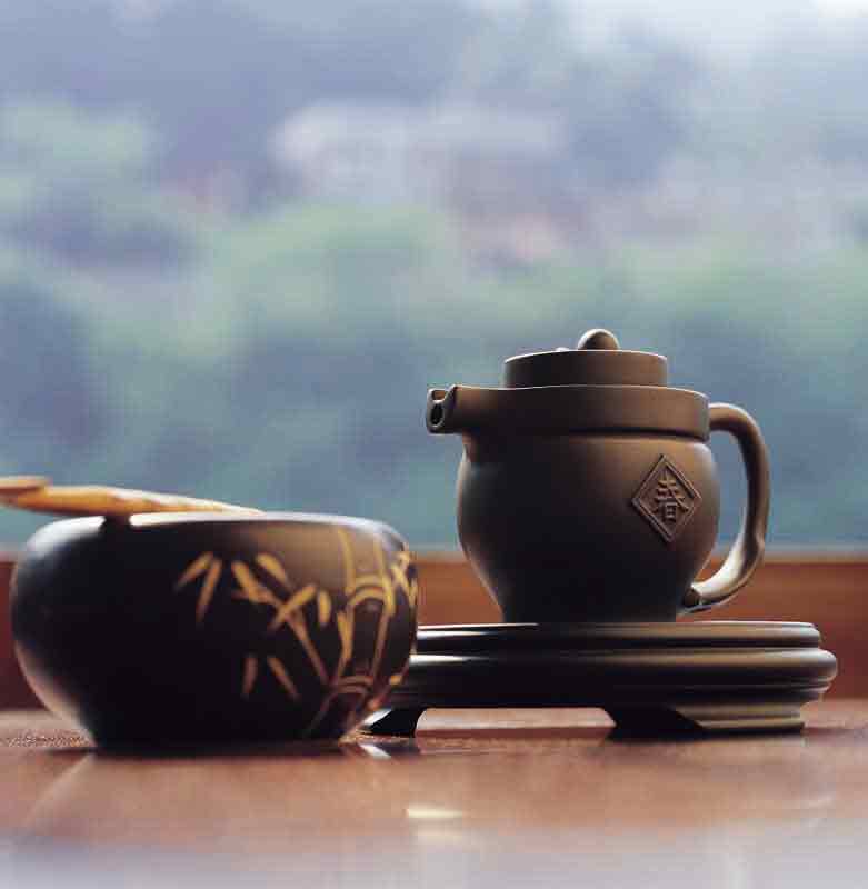 عکس زیبا از قوری سفالی قهوه ای