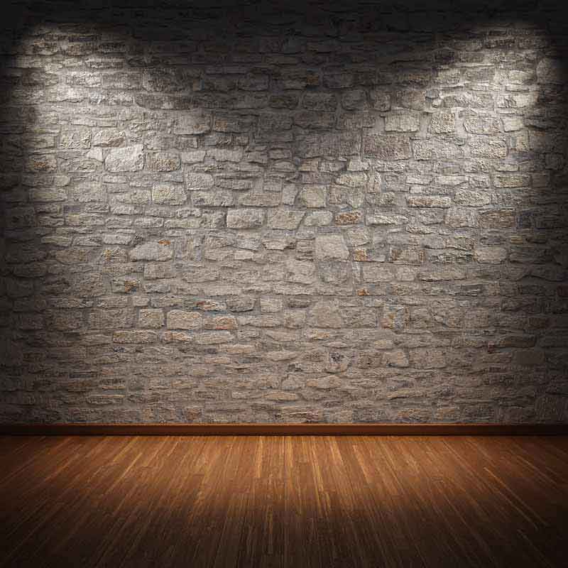 عکس با کیفیت از دیوار سنگی با نور