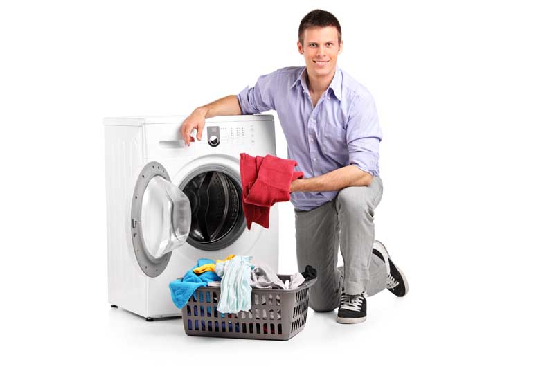 عکس با کیفیت از ماشین لباس شویی و لباس