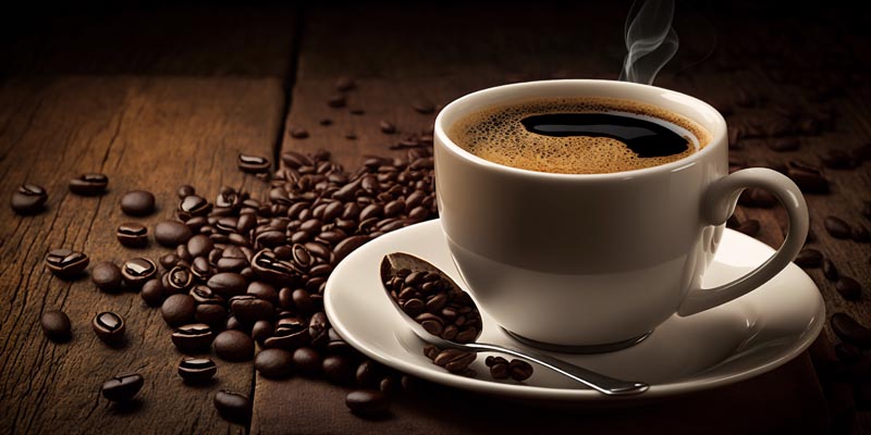 عکس زیبا از فنجان قهوه داغ و قاشق